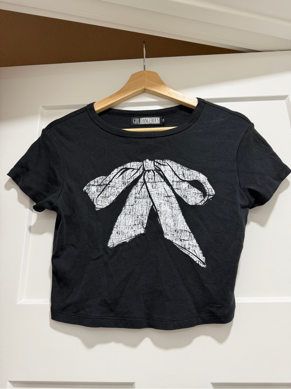 Free People Black Cropped Tee with White Bow Graphic